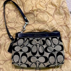 COACH wristlet. Black/gray color. Authentic. With dust bag.